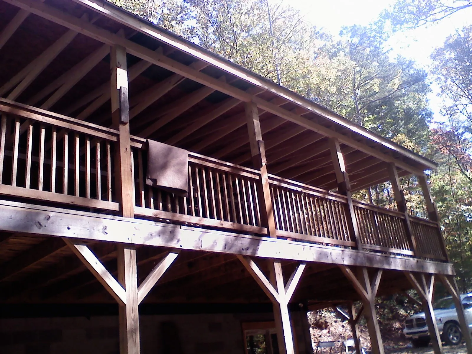 Timber framing under a new elevated porch and deck — Roof Leak Repair in Lavalette by Roofing Brothers