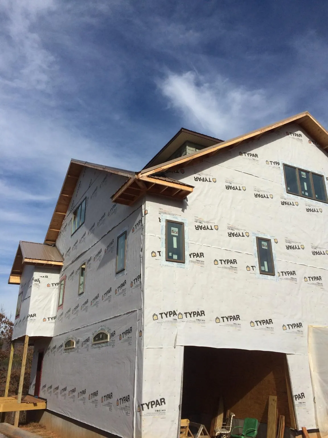 Stick built house wrapped in Typar with new roof framing and dormers in Lavalette